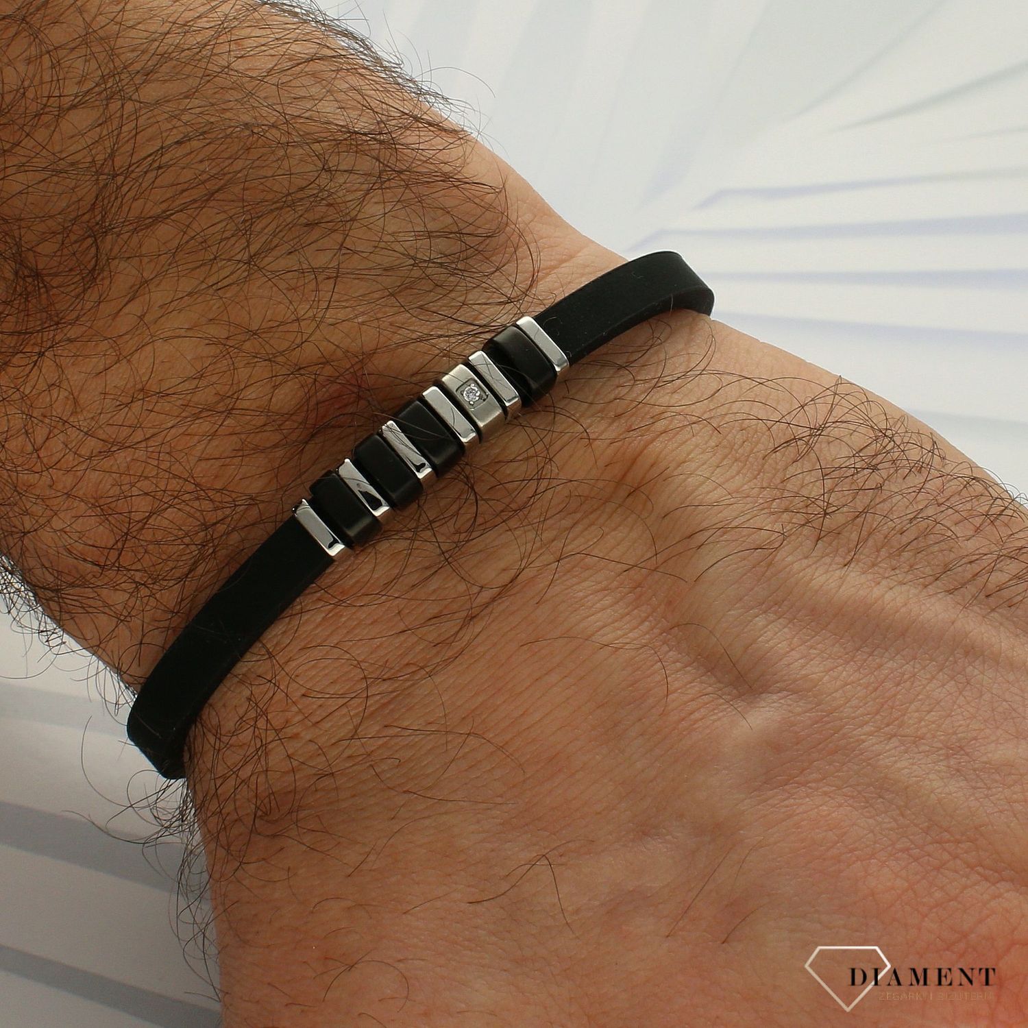 Bransoletka męska Nomination kauczuk z czarną cyrkonią z kolekcji CIty 028804 015 z czarną cyrkonią. Bransoletka w kolorze czarnym wykonana z kauczuku i stali szlachetnej 316L..jpg